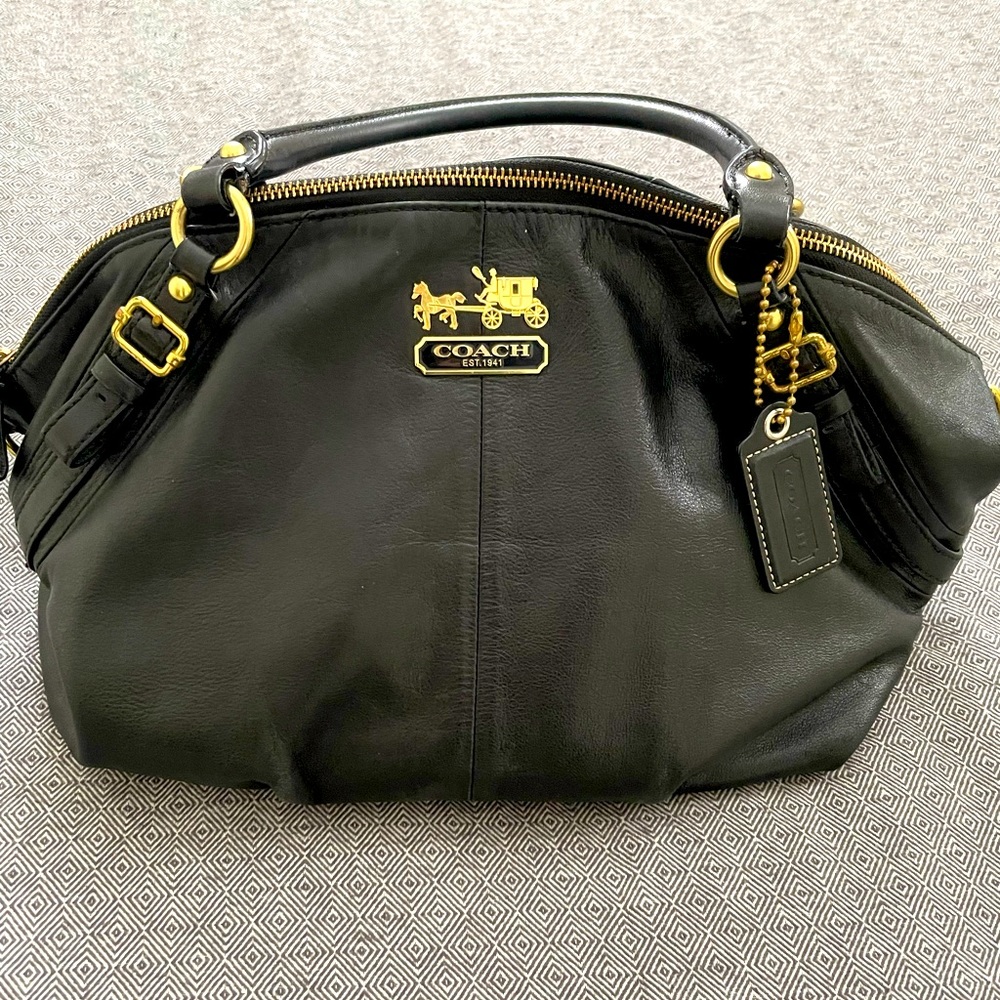 Authentic Coach purse, has regular sign of wear , no rips, from smoke free home.